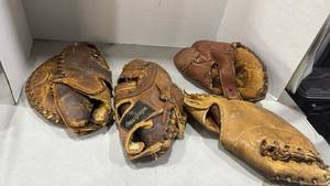 lot 2049 image: MacGregor and other Baseball Catchers Mitts Collection
