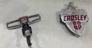lot 2061 image: Crosley Radio Hood Ornament and emblem