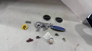 lot 2062 image: Ford Automotive Pin Collection, emblems and more