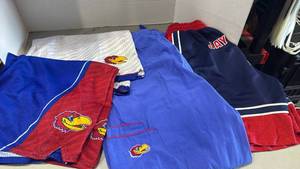 lot 2088 image: KU athletic shorts and scrub pants size L