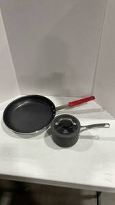 lot 3130 image: Calphalon pot and lid with Tramontina skillet