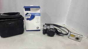 lot 5024 image: Sony Digital Cameras, case and wipes