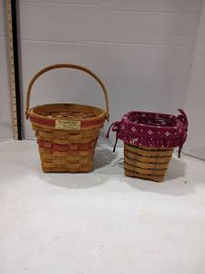 lot 4073 image: Longaberger Baskets.   Poinsettia Basket and Button Basket