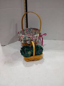 lot 4094 image: Longaberger Handwoven Baskets with Floral Liners.  1993 and 1999