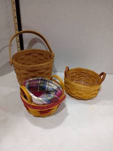 lot 4101 image: Longaberger Round Handwoven Baskets.   1983 and 1999