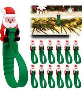 lot 12229 image: Christmas Santa Straw Holders With Adhesive On The Back 24Pck