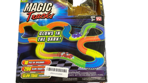 lot 15647 image: Ontel Magic Tracks 10 Foot Glow In The Dark Bendable Flexible Racetrack with LED Light-Up Race Car, Educational Playset Birthday Gift for Ages 3
