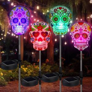 lot 11796 image: Retisee 4 Pack Day of The Dead Sugar Skull Solar Lights with Stakes Outdoors Skull Solar Yard Decorations Waterproof Lights for Halloween Outdoor Garden Lawn Patio Porch Pathway Decor Favors