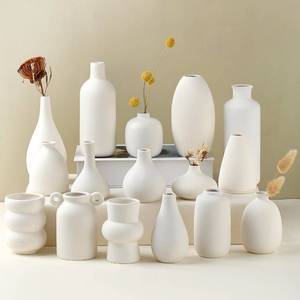 lot 1651 image: Parlamain Set of 16 White Ceramic Bud Vases, Minimalist Boho Small Pampas Grass Flower Vase for Farmhouse Home Decor, Wedding Centerpiece, Shelf and Table Decoration