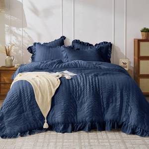 lot 8118 image: JOLLYVOGUE Navy Blue Comforter Full Size, 3 Pieces Seersucker Lightweight Full Size Bedding, All Season Fluffy Microfiber Bedding Comforter Set with 1 Ruffle Comforter and 2 Ruffle Pillowshams