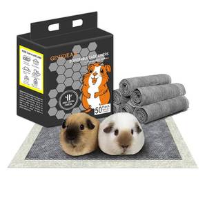 lot 11954 image: GINIDEAR Guinea Pig Bedding, Disposable Guinea Pig Cage Liners, Charcoal Odor Controlling Absorbent Waterproof Pee Pads for Rabbits, Hamster and Other Small Animals. 18ftftx31ftft,50 Count