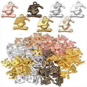lot 12156 image: BronaGrand 70pcs Graduation Cap Charm Pendants Alloy Graduate Hanging Charm with Diploma Pendant Graduation Charms for DIY Jewelry Bracelet Necklace Making and Crafting,7 Colors