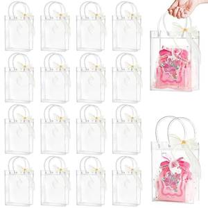 lot 14449 image: Ohuimrt 24 PCS Clear Plastic Gift Bags with Handles, 5.9 x 7.9 x 2.8 InchesReusable Party Favor Bags with Ribbon Transparent Gift Wrap Bags Bulk for Weddings Birthdays
