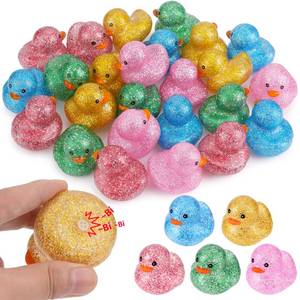 lot 18015 image: 25Pcs Mini Glitter Rubber Ducks Bath Toys, Bathtub Floating Squeaky Duck Bulk Baby Preschool Bath Toy for Baby Shower Infants Kids Toddler Birthday Party Decoration Gift (Large)