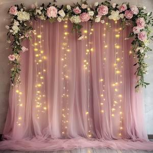 lot 1735 image: Xiomot Tulle Backdrop Curtain with Lights String 10FT X 10FT Dusty Rose Sheer Tulle Backdrop Curtains for Wedding Birthday Party Reception Photo Booth Background Decorations (2 Panels 5x10FT)