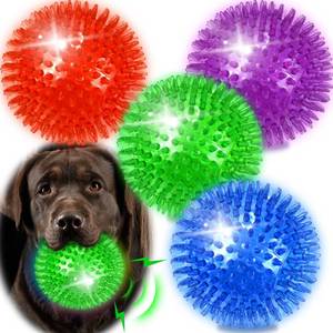lot 9589 image: Ousiya 4 Pack 4.5 Light Up Squeaky Dog Balls, Spiky Dog Toy Balls for Medium Large Dogs