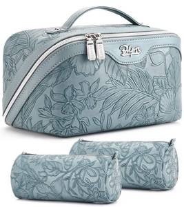 lot 13057 image: BOYATU Travel Makeup Bags Cosmetic Organizer Bag 3 Pcs Set Large Capacity Floral Make up Bag with Compartments - Waterproof Leather Toiletry Bags with Handle for Women (01-Light Blue)