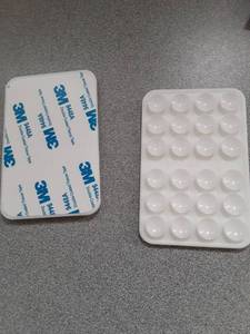 lot 16007 image: Two Pack Adhesive Back Suction Phone Holder, 2 Pack - Retail $0