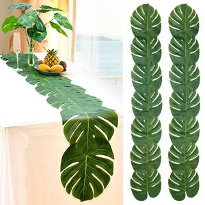 lot 16101 image: AerWo 2Pcs Artificial Palm Leaves Green Table Runner, Summer Tropical Leaf Table Runners 72 inches Long for Wedding Moana Jungle Safari Tropical Hawaiian Luau Party Decorations - Retail $15