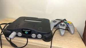 lot 24 image: Nintendo 64 Console with Controller - Retail $125