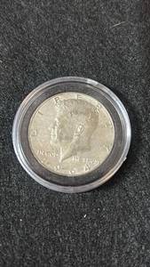 lot 61 image: 1964 Kennedy Half Dollar in Protective Case 90% silver