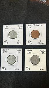 lot 86 image: International Coin Collection - Japanese Yen and British Penny Set