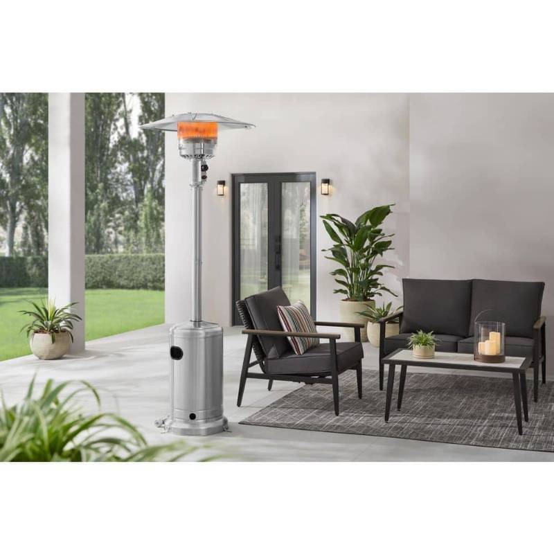 lot 15237 image: Hampton Bay 48K BTU Stainless Steel Patio Heater - Retail $300
