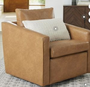 lot 16984 image: Better Homes & Gardens Steele Swivel Accent Chair, Camel Faux Leather - Retail $286