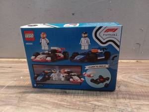 lot 6802 image: Marvel Avengers Epic World of Action Captain America Shield-Shot Cycle Figure & Toy Motorcycle Blue
