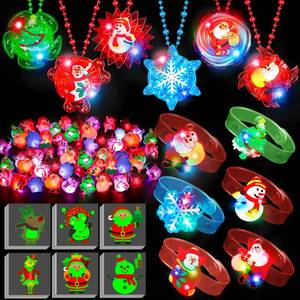 lot 7358 image: 84 PCS Christmas Party Favors Glow in The Dark Toys