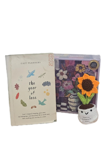 lot 7399 image: The Year of Less Book, Puzzle and Crochet Sunflower Bundle (See Details)