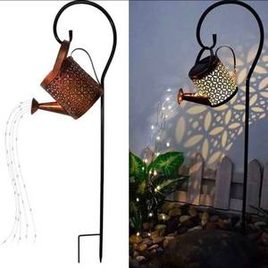 lot 7415 image: Pattern Copper Solar Watering Can Light Garden Decor