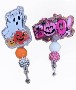 lot 32532 image: Halloween Ghost and Pumpkin Badge Reels Set