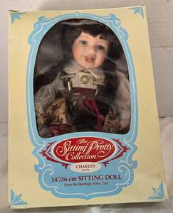 lot 137 image: Heritage Mint Sitting Pretty Collection Charles D174 Porcelain Doll