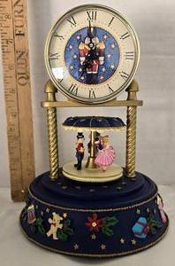 lot 140 image: Nutcracker Musical Rotating Clock