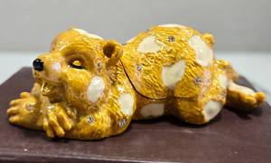 lot 216 image: Bejeweled Sleeping Bear Trinket Box. Hand Painted Enamel with Swarovski Crystals
