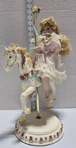 lot 245 image: Decorative Carousel Horse with Porcelain Doll