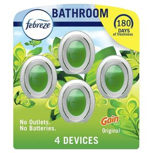 lot 277 image: Febreze Small Spaces Air Freshener, Odor-Fighting, Gain Original Scent, 4 Count, picture is Different than box product