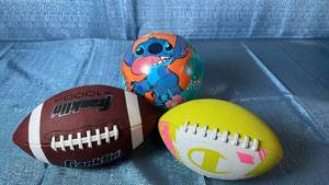 lot 2077 image: Multiple Kids Play Balls. Stitch Bounce Ball. Franklin Junior Football. Champion PeeWee Football.