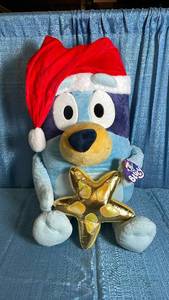 lot 3024 image: Christmas Blue Dog Plush with Gold Star