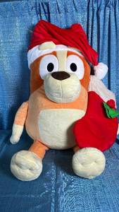 lot 3025 image: Pokemon Buizel Christmas Plush with Santa Hat