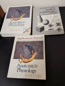 lot 365 image: Martini Anatomy & Physiology 4th Edition Complete Set