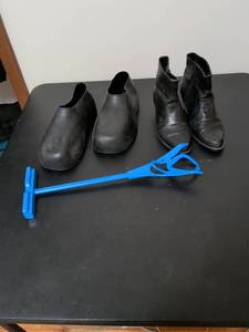lot 390 image: Black Leather Ankle Boots Collection with Blue Boot Stand