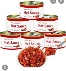 lot 5013 image: Sun Grains Hot Sauce - 8 Can Bundle