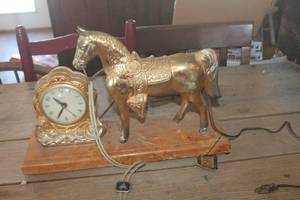 lot 3871 image: Vintage United Horse Clock untested