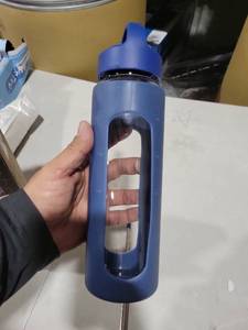 lot 2118 image: WINSA 24 oz Glass Water Bottle, Glass Tumbler with Straw, Reusable Drinking Bottles with 2 Lids-Handle Lid&Bamboo Straw Lid, Silicone Sleeve, for Sports, Home,1 Pack-Blue