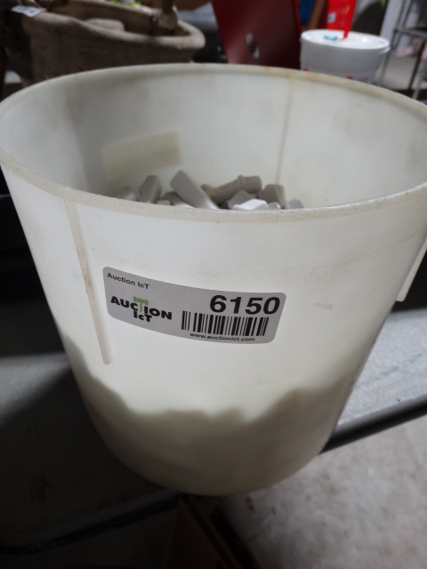 lot 6150 image: Small bucket with small tile pieces.