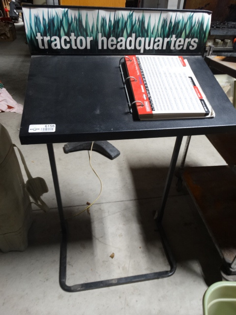 lot 6156 image: Tractors headquarters stand.