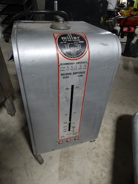 lot 6225 image: Miller acarc welder on wheels.