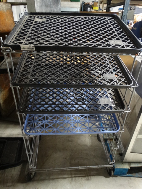 lot 6236 image: Bread rack on wheels w 4 trays.
